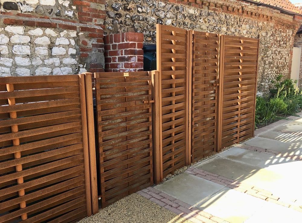 woven steel screens to hide oil tanks