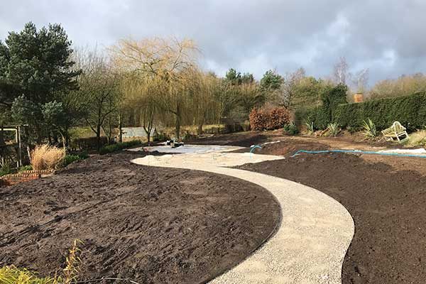 Sweeping curves for decorative metal lawn edging